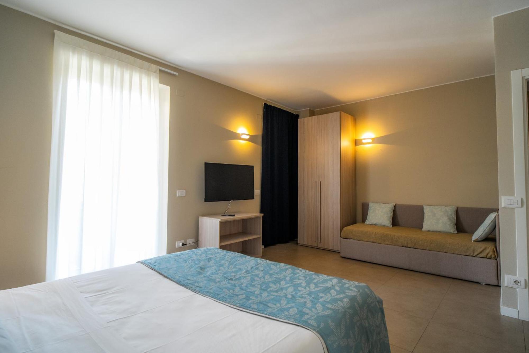 Residence San Marco Suites&Apartments Алассіо Екстер'єр фото