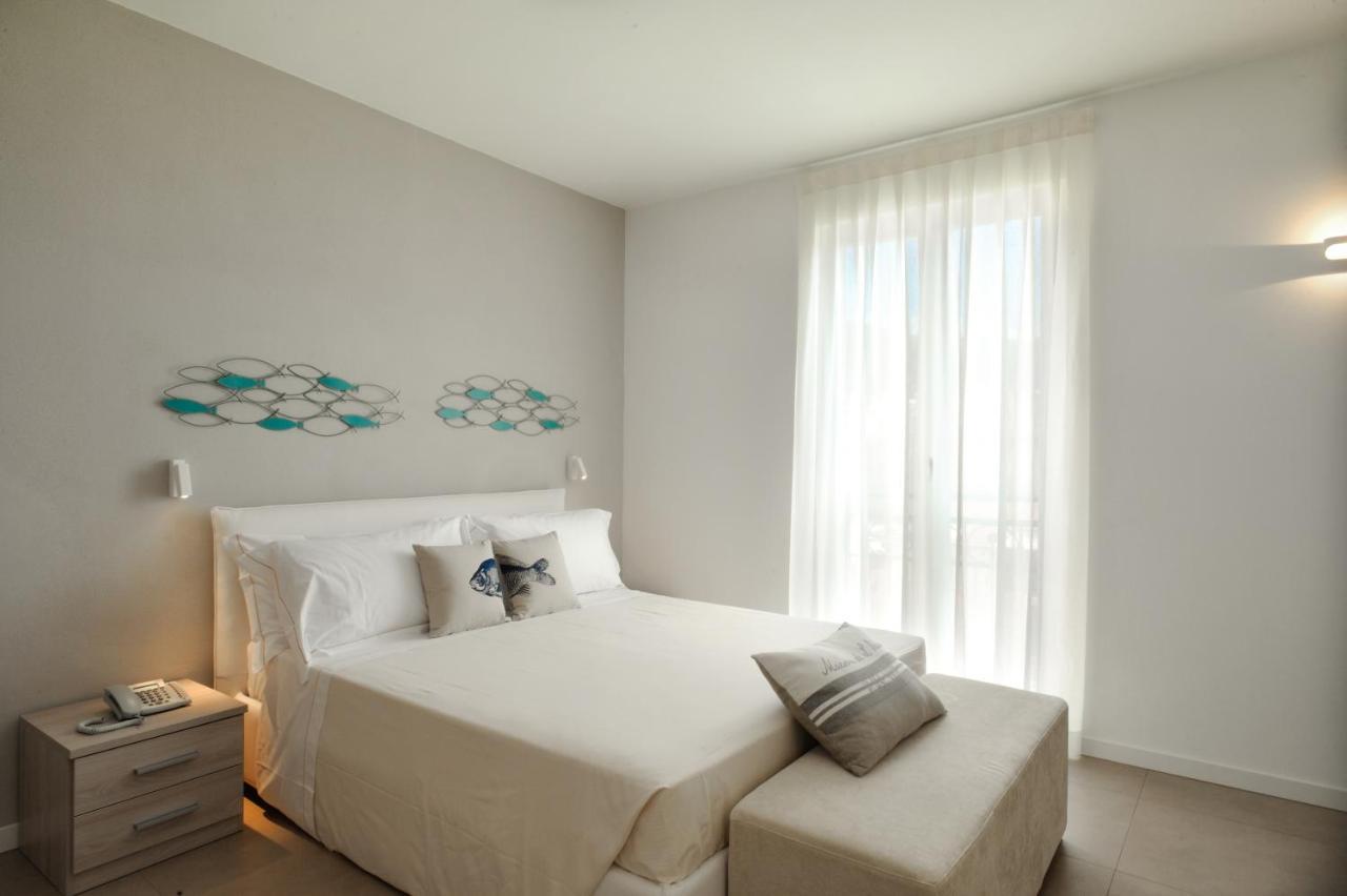 Residence San Marco Suites&Apartments Алассіо Екстер'єр фото